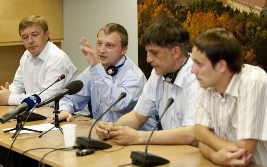 Iš kairės: Ramūnas Karbauskis, Michailas Kostiajevas, Vladimiras Sultanovas