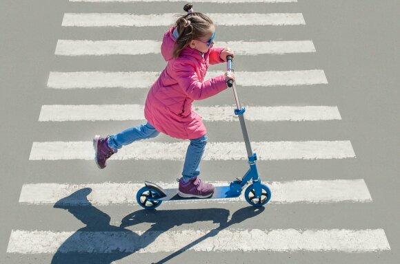 Children with scooters.