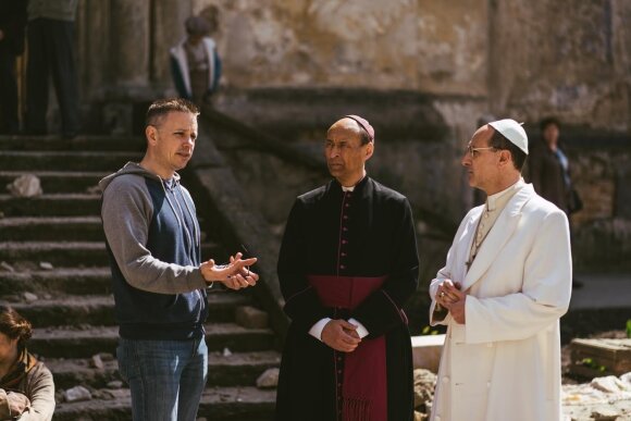 Chris Cassel on the set of Pope vs. Hitler. Lithuanian Vaidotas Martinaitis plays the cardinal in the middle